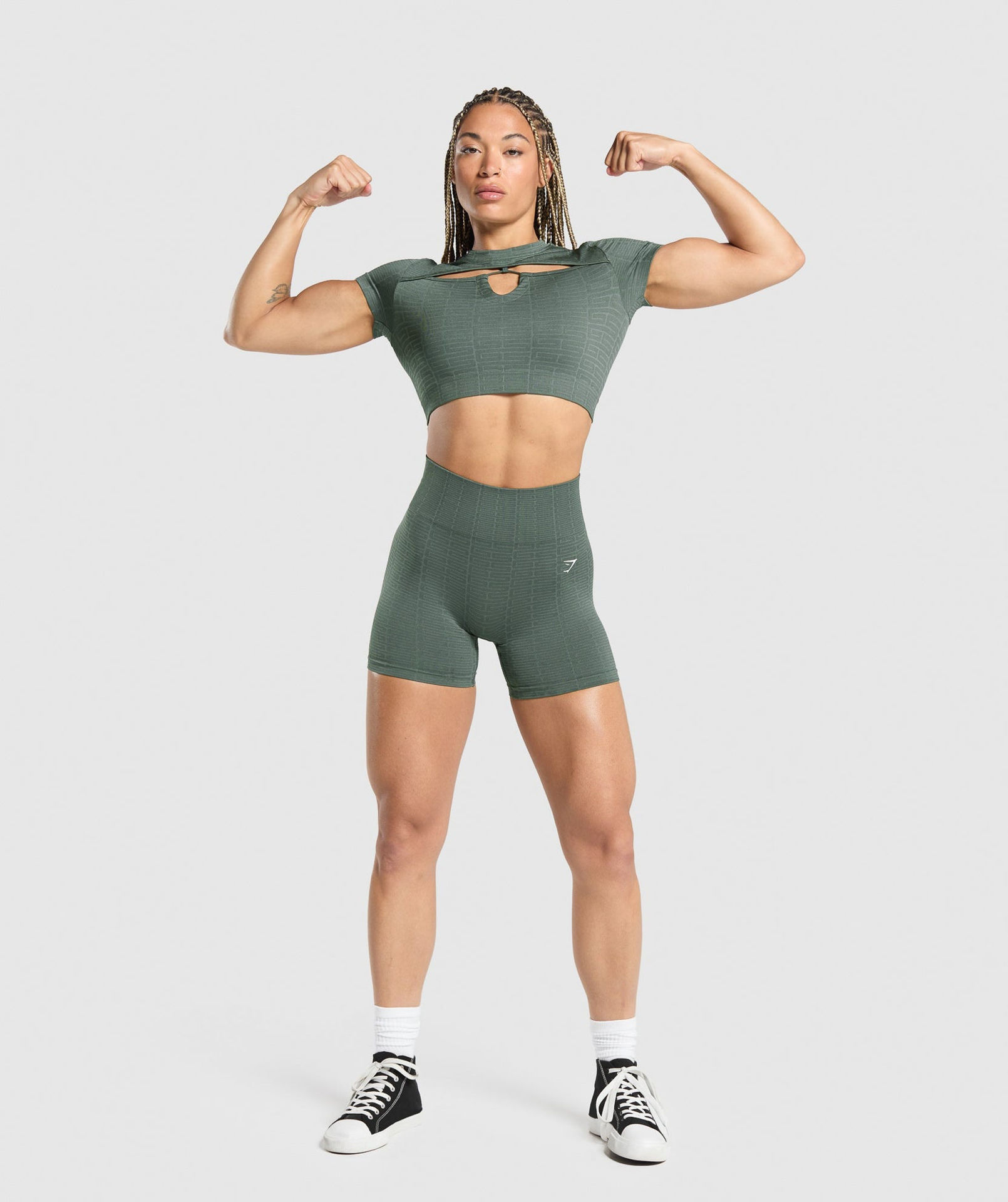 ADAPT MONOGRAM SEAMLESS RUCHED CROP TOP