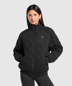 QUILTED ZIP THROUGH
