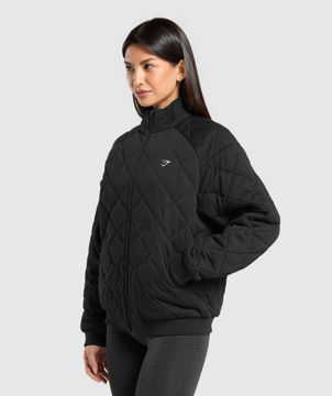 QUILTED ZIP THROUGH